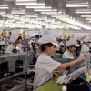 Sản xuất điện thoại di động tại Công ty Điện tử Samsung Việt Nam Thái Nguyên, doanh nghiệp 100% vốn đầu tư của Hàn Quốc. (Ảnh: Danh Lam/TTXVN)