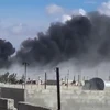 Khói bốc lên từ các cuộc không kích tại thị trấn Talbisseh, tỉnh Homs, Syria ngày 30/9 vừa qua. (Ảnh: AFP/TTXVN)