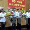 Ông Nguyễn Ngọc Quang (thứ hai từ trái) và ông Phan Việt Cường (thứ hai từ phải) tại Hội nghị bàn về công tác nhân sự tỉnh Quảng Nam. (Ảnh: Nguyễn Sơn/TTXVN)