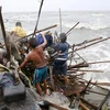 Nhà của một gia đình sống ở vịnh Manila bị tàn phá do gió lớn của bão Koppu gây ra hôm 18/10. (Nguồn: Reuters) 