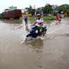 Nhiều khu vực của Hà Nội thường xuyên bị ngập úng chỉ sau một trận mưa lớn. (Ảnh: Minh Sơn/Vietnam+)