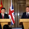Thủ tướng Anh David Cameron và Chủ tịch Trung Quốc Tập Cận Bình. (Ảnh: THX/TTXVN)