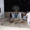 Hiện trường vụ đánh bom ở Bhag, tỉnh Balochristan, miền Tây Nam Pakistan. (Ảnh: THX/TTXVN)