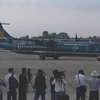 Máy bay ATR 72 số hiệu VN-B218 bay chặng Lâm Đồng-Cần Thơ đáp xuống sân bay Cần Thơ. (Ảnh: Duy Khương/TTXVN)