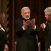 Thủ tướng Ấn Độ Narenda Modi (giữa), Chủ tịch Thượng viện Anh Baroness D'Souza (trái) và Chủ tịch Hạ viện Anh John Bercow tại phiên họp Quốc hội ở thủ đô London ngày 12/11. (Ảnh: AFP/TTXVN)