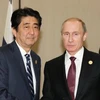 Tổng thống Nga Vladimir Putin và Thủ tướng Nhật Bản Sindzo Abe. (Ảnh: Kyodo/TTXVN)