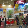 Gian hàng của Công ty càphê Mê Trang tại Hội chợ thu hút rất đông khách tham quan và thưởng thức càphê. (Ảnh: Vũ Toàn-Phạm Duy/Vietnam+)