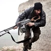 Một tay súng của lực lượng nổi dậy tại Syria. (Nguồn: AP)