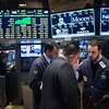 Sàn giao dịch chứng khoán New York ngày 4/12 vừa qua. (Ảnh: AFP/TTXVN)