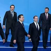 Thủ tướng Trung Quốc Lý Khắc Cường và Thủ tướng Nga Dmitry Medvedev cùng một số lãnh đạo của các chính phủ thành viên SCO. (Nguồn: Xinhua)