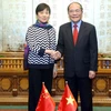 Chủ tịch Quốc hội Nguyễn Sinh Hùng tiếp bà Lý Tiểu Lâm, Chủ tịch Hội hữu nghị đối ngoại Nhân dân Trung Quốc. (Ảnh: Nhan Sáng/TTXVN)