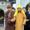 Hòa thượng Thích Phổ Tuệ (áo vàng), Pháp chủ Hội đồng Chứng minh Giáo hội Phật giáo Việt Nam. (Ảnh: An Đăng/TTXVN)