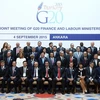 Các Bộ trưởng Tài chính và Thống đốc Ngân hàng nhóm G20 chụp ảnh chung tại Hội nghị Bộ trưởng Tài chính và Thống đốc Ngân hàng G20 ở Thổ Nhĩ Kỳ tháng 9/2015. (Ảnh: AFP/TTXVN)
