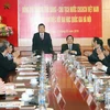 Chủ tịch nước Trương Tấn Sang phát biểu tại buổi làm việc với cán bộ chủ chốt của Đại học Quốc gia Hà Nội. (Ảnh: Nguyễn Khang/TTXVN )