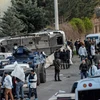 Lực lượng đặc nhiệm Thổ Nhĩ Kỳ điều tra tại hiện trường vụ đánh bom ở Diyarbakir vào sáng 1/4. (Ảnh: AFP/TTXVN)