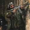 Tay súng phe đối lập Syria. (Ảnh: darkroom.baltimoresun.com)