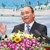 Thủ tướng Nguyễn Xuân Phúc dự và phát biểu tại Hội nghị xúc tiến đầu tư và quảng bá du lịch vào tỉnh Lai Châu lần thứ nhất. (Ảnh: Thống Nhất/TTXVN)