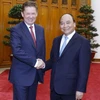 Thủ tướng Nguyễn Xuân Phúc tiếp Chủ tịch Hội đồng quản trị Tập đoàn Dầu khí Gazprom (Liên bang Nga) Aleksey Miller đang ở thăm và làm việc tại Việt Nam. (Ảnh: Thống Nhất/TTXVN)