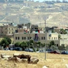 Quang cảnh bên ngoài Văn phòng cơ quan tình báo Jordan trại Baqaa sau vụ tấn công ngày 6/6 vừa qua. (Ảnh: AFP/TTXVN)
