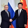Chủ tịch Trung Quốc Tập Cận Bình (phải) và Tổng thống Nga Vladimir Putin hội đàm tại Tashkent của Uzbekistan. (Ảnh: THX/TTXVN)