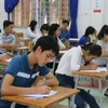 Các thí sinh làm bài thi môn lịch sử tại Hội đồng thi trường Đại học An Giang. (Ảnh: Công Mạo/TTXVN)