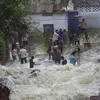 Cảnh ngập lụt sau những trận mưa lớn tại Bhopal, bang Madhya Pradesh, miền trung Ấn Độ ngày 9/7. (Ảnh: THX/TTXVN)