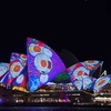 Nhà hát Opera Sydney lung linh sắc màu trong lễ hội "Vivid Sydney 2016," hồi tháng Sáu vừa qua. (Ảnh: THX/TTXVN)