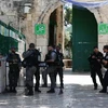 Cảnh sát Israel gác ở lối vào đền thờ Hồi giáo Al-Aqsa ngày 27/6 vừa qua. (Ảnh: AFP/TTXVN)