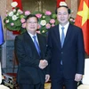Chủ tịch nước Trần Đại Quang tiếp Phó Chủ tịch Quốc hội Lào Somphanh Phengkhammy đang thăm chính thức Việt Nam. (Ảnh: Nhan Sáng/TTXVN)