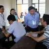 Thứ trưởng Bộ Giáo dục và Đào tạo Bùi Văn Ga đến kiểm tra công tác tổ chức thi THPT quốc gia năm 2016 tại Cụm thi số 40 Đại học Đà Nẵng. (Ảnh: Trần Lê Lâm/TTXVN)