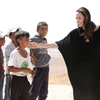 Đặc phái viên của Cao ủy Liên hợp quốc về người tị nạn Angelina Jolie Pitt - mặc váy đen. (Nguồn: Getty Images)