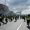 Cảnh sát làm nhiệm vụ trong cuộc biểu tình của lực lượng đối lập ở Caracas, Venezuela ngày 1/9 vừa qua. (Ảnh: AFP/TTXVN)