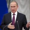 Tổng thống Nga Vladimir Putin phát biểu trong cuộc họp tại Moskva ngày 22/9 vừa qua. (Ảnh: EPA/TTXVN)