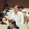 Đại biểu Quốc hội tỉnh Kon Tum Tô Văn Tám phát biểu ý kiến. (Ảnh: Phạm Kiên/TTXVN)