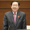 Bộ trưởng Bộ Nội vụ Lê Vĩnh Tân trả lời chất vấn. (Ảnh: Phương Hoa/TTXVN )