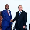 Thủ tướng Nguyễn Xuân Phúc tiếp ông Jaime Basilio Monteiro, Bộ trưởng Bộ Nội vụ Mozambique. (Ảnh: Thống Nhất/TTXVN)