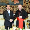 Chủ tịch nước Trần Đại Quang hội kiến Thủ tướng Vatican Parolin. (Ảnh: Nhan Sáng/TTXVN)