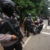 Cảnh sát Indonesia điều tra tại hiện trường một vụ tấn công. (Ảnh: AFP/TTXVN)