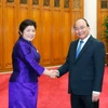 Thủ tướng Nguyễn Xuân Phúc tiếp bà Souvanpheng Boupphanouvong, Bộ trưởng Văn phòng Thủ tướng Lào đang thăm và làm việc tại Việt Nam. (Ảnh: Thống Nhất/TTXVN)