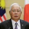 Thủ tướng Malaysia Najib Razak trong cuộc họp báo ở Tokyo ngày 16/11 vừa qua. (Ảnh: AFP/TTXVN)