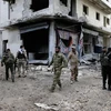 Binh sỹ Syria tuần tra tại thị trấn al-Bab ngày 3/12 vừa qua. (Ảnh: AP/TTXVN)