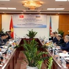 Bộ trưởng Công thương Việt Nam Trần Tuấn Anh và Bộ trưởng Bộ Năng lượng Azerbaijan Natiq Aliyev đồng chủ trì kỳ họp. (Ảnh: Trần Việt/TTXVN)