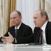 Thư ký Hội đồng An ninh Nga Nikolai Patrushev (trái) và Tổng thống Nga Vladimir Putin (phải). (Ảnh: AFP/TTXVN)