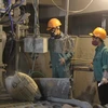 Sản xuất ximăng tại Công ty cổ phần ximăng Quán Triều VVMI. (Ảnh: Hoàng Nguyên/TTXVN)