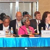Đại biểu Hoa Kỳ và Thái Lan tham dự phiên họp Đối tác chính sách về An ninh lương thực. (Ảnh: Nguyễn Khang/TTXVN)
