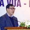 Thứ trưởng Bộ Kế hoạch và Đầu tư Đặng Huy Đông phát biểu tại hội thảo. (Ảnh: Danh Lam/TTXVN)