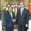 Chủ tịch nước Trần Đại Quang tiếp Trung tướng Somkeo Silavong, Bí thư Trung ương Đảng Nhân nhân Cách mạng Lào, Bộ trưởng Bộ An ninh Lào. (Ảnh: Nhan Sáng/TTXVN)