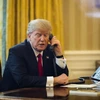 Tổng thống Mỹ Donald Trump điện đàm từ Washington, DC ngày 29/1 vừa qua. (Ảnh: EPA/TTXVN)