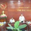 Phó Chủ tịch Ủy ban Nhân dân tỉnh Hậu Giang Trương Cảnh Tuyên phát biểu tại một buổi họp của tỉnh. (Ảnh: Hồng Thái/TTXVN)