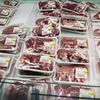 Thịt đóng gói được bày bán tại siêu thị ở Hong Kong, Trung Quốc ngày 22/3 vừa qua. (Ảnh: EPA/TTXVN)